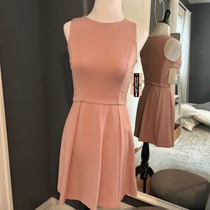 Design lab soft blush knit sleeveless zip back dress. Never worn tags still on.